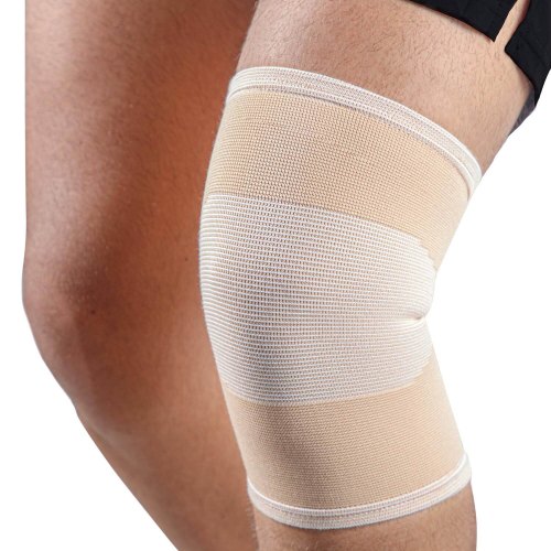 1 exemplaar Mövibrace Knie Bandage Beige Maat M